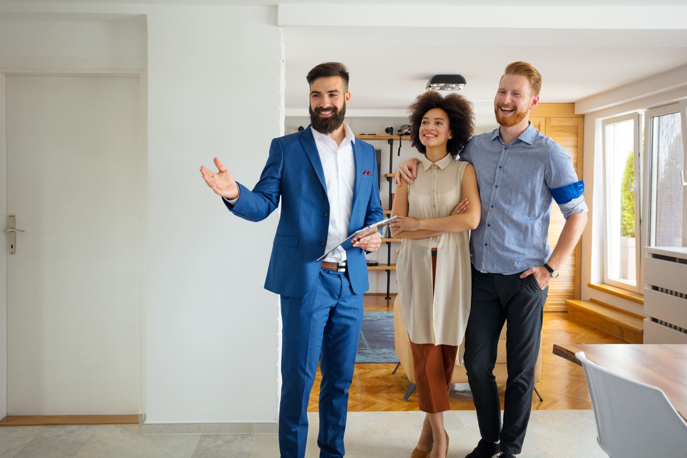 Real estate agent with clients